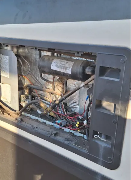 Appliance orifice + burner service on an RV in Florida