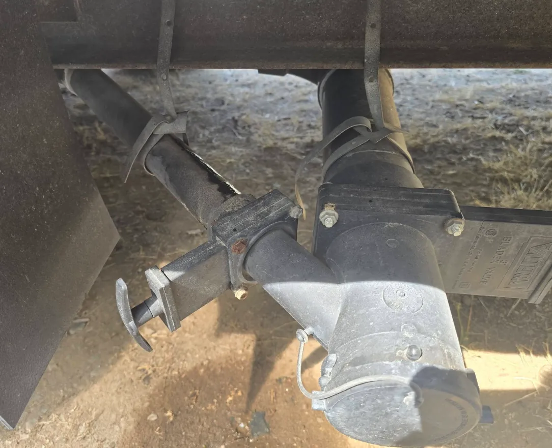 Gray tank valve + cable on an RV in Florida